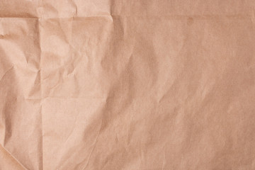 The texture of crumpled brown crumpled paper