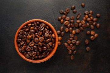 coffee beans on stone background, close-up