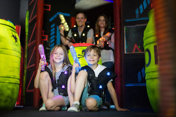 Canvas Print - Kids sitting with laser guns