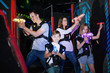© JackF - Parents and children playing laser tag