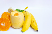 Orange Mix Banana Smoothies Yellow Colorful Fruit Juice Milkshake Blend Beverage Healthy High Protein The Taste Yummy In Glass,drink To Lose Weight Drink Episode Morning On White  Background.
