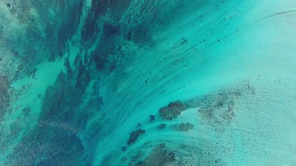 Wall Mural - le morne underwater waterfall at mauritius with turquoise sea water aerial background