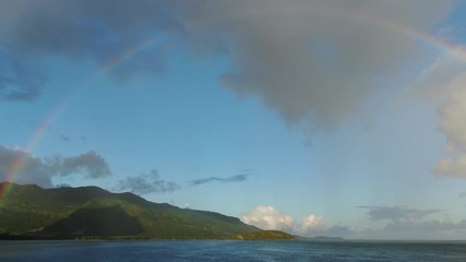 Wall Mural - a beautiful rainbow in tropical lagoon