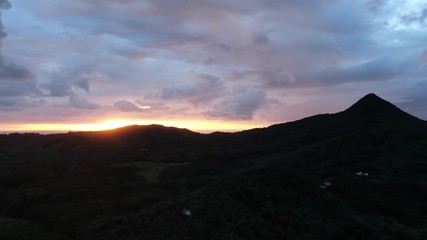 Wall Mural - beautiful tropical sunset sky with silhouettes of hikes