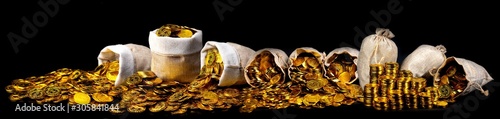 Fotomural Stacking gold coin in treasure sack lot of at black background