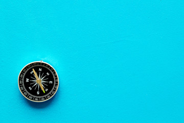 Wall Mural - Compass - small and stylish - on blue background top view copy space