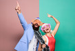 © be free - Christmas party office. Winter corporate party. Office christmas party. Happy man and woman wear santa hats and funny sunglasses. Manager tinsel celebrate new year. Corporate holiday party ideas