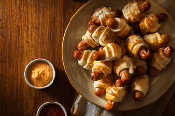 Canvas Print - Pigs in blankets. Dark mood