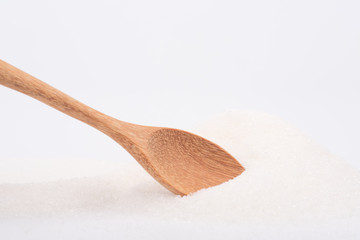 Close up of organic refined sugar on a white background