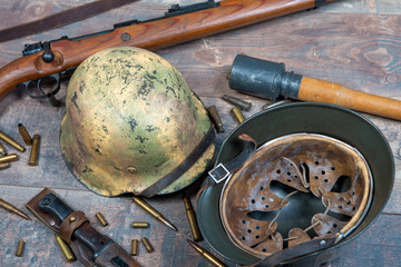 Wall Mural - ww2 german army field equipment with helmets and rifle