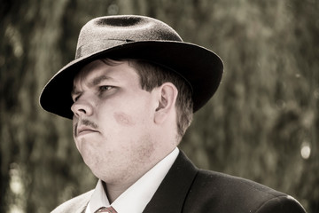 portrait of a man in hat