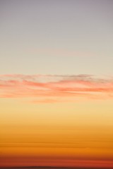 Wall Mural - the golden sunset sky over the pacific ocean