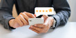 © chinnarach - close up on businessman hand press on smartphone screen with gold five star rating feedback icon and press level excellent rank for giving best score point to review the service , technology business