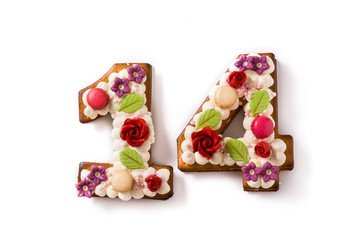 Valentine's Day cake with 14 number with flowers decorated isolated on white background. 