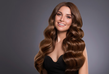 beautiful hair woman long curly hairstyle natural makeup cosmetic concept