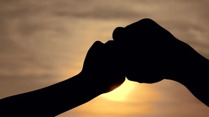 teamwork concept. of a human hand with bumping fist. friends friendship fist bump togetherness conce