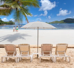 chairs and umbrella on the beach, Seychelles Islands 