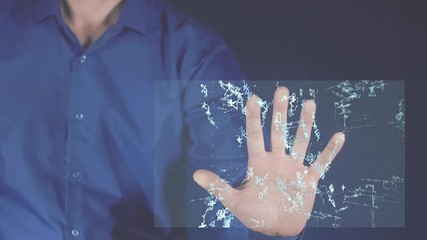 Wall Mural - the concept of repair and maintenance. futuristic digital technology. the man touches the monitor on