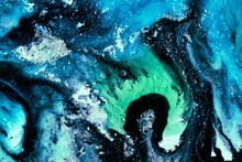 Abstract Liquid Paint Background. A View From Space On An Exoplanet Sea Or Ocean. Colorful Blue Green Swirl Wave Storm