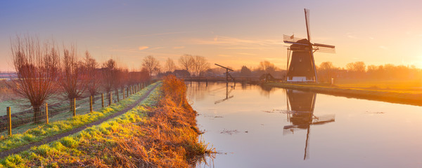 Wall Mural - Traditional Dutch windmill near Abcoude, The Netherlands at sunrise