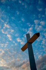 Wall Mural - Large cross with blue evening sky