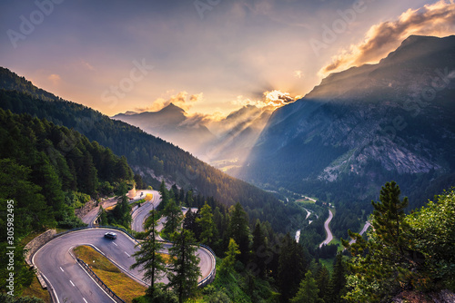 Cuadros en Lienzo Maloja Pass road in Switzerland at sunset