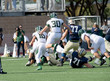 © Joe - Action photos of high school football players making amazing plays during a football game