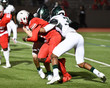 © Joe - Action photos of high school football players making amazing plays during a football game