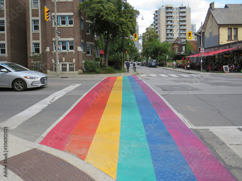 Fotomural Toronto Canada; August 24, 2019: crosswalk painted with the LGBT flag, gay pride