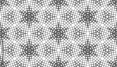 Abstract seamless pattern of geometric shapes. Stars in a hexagonal grid.