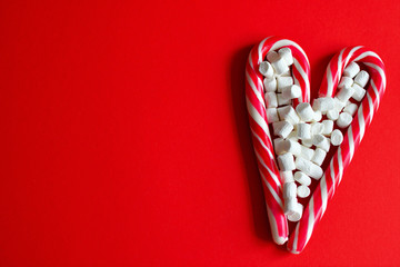 sweet heart from Marshmallow on red background