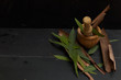 © Antonio - eucalyptus medicine tea over wood in dark background