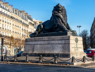 Wall Mural - Lion of Belfort statue in Denfert Rochereau square - Paris, France. The Lion of Belfort is a bronze sculpture by Frederic Auguste Bartholdi (1834-1904).