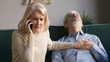 © fizkes - Wife makes emergency call while husband lies with heart attack
