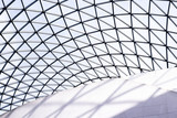 Fototapeta Londyn - Modern architectural design of glass roof abstract at the british museum in london
