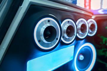 Wall Mural - colorful lights of stereo and speakers in car