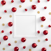 Red Christmas Ball And Gold Snowflake With White Paper Frame