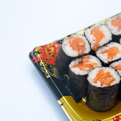 Wall Mural - Sushi Roll with salmon on the white background .Food abstract background