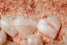 Himalayan Pink Salt Crystals Beside Heart Shaped Salt Rocks