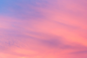 Wall Mural - Abstract fantasy aerial view pastel background, Pink sunlight on sweet colorful sky and purple cloud before sunset