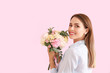 © Pixel-Shot - Beautiful young woman with bouquet of carnation flowers on color background