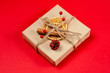 Christmas gift handmade on red background. copy space for text. top view. Merry Christmas