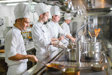 Wall Mural - cook cooks in a restaurant.