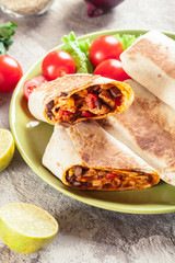 Wall Mural - Burritos wraps with mincemeat, beans and vegetables