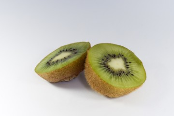 Ripe kiwi on white background