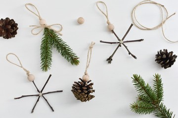 Eco friendly minimalist Christmas tree ornaments made from natural elements, flat lay composition. Zero waste Christmas.