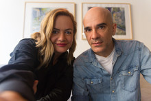 Joyful Worried Middle Aged Couple Taking Selfie At Home. Caucasian Man And Woman In Casual Looking At Camera, Smiling. Selfie Or Video Call Concept