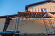 © schankz - Installation of siding on the walls of the house