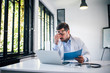 © bnenin - Portrait of a tired doctor at work in medical office.