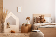 Beige Kid's Room With Wooden Nightstand With Flowers And Books And Single Bed With Teddy Bear